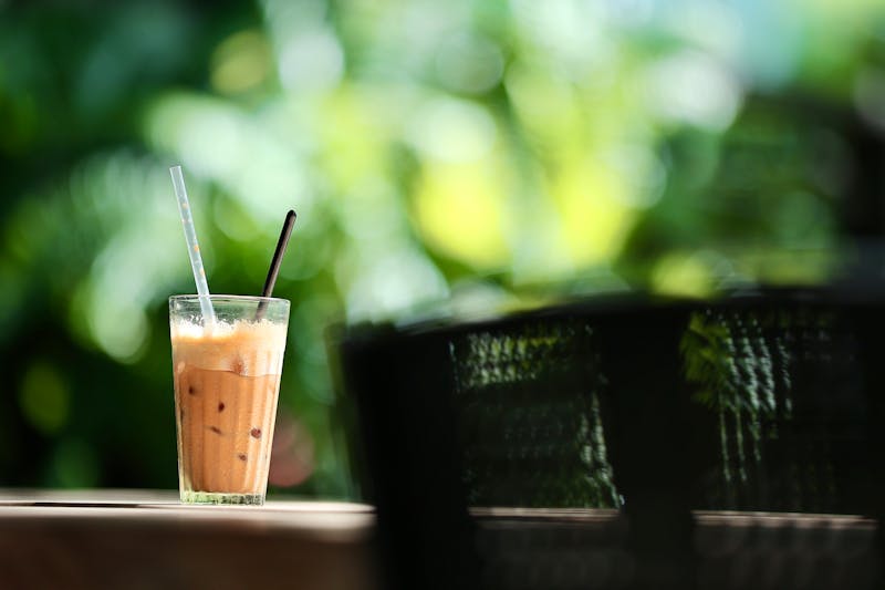 Iced coffee drink with ice and cream